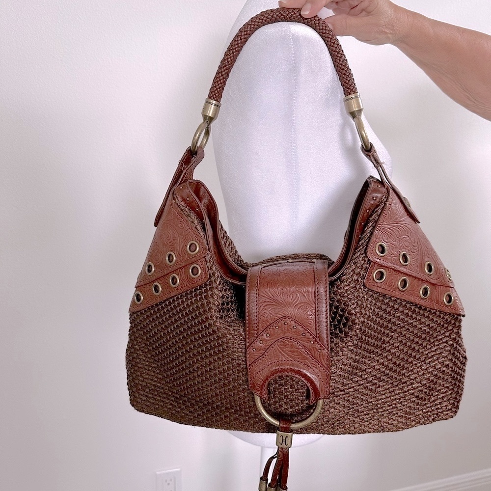 Cole Haan leather and woven thread Handbag.